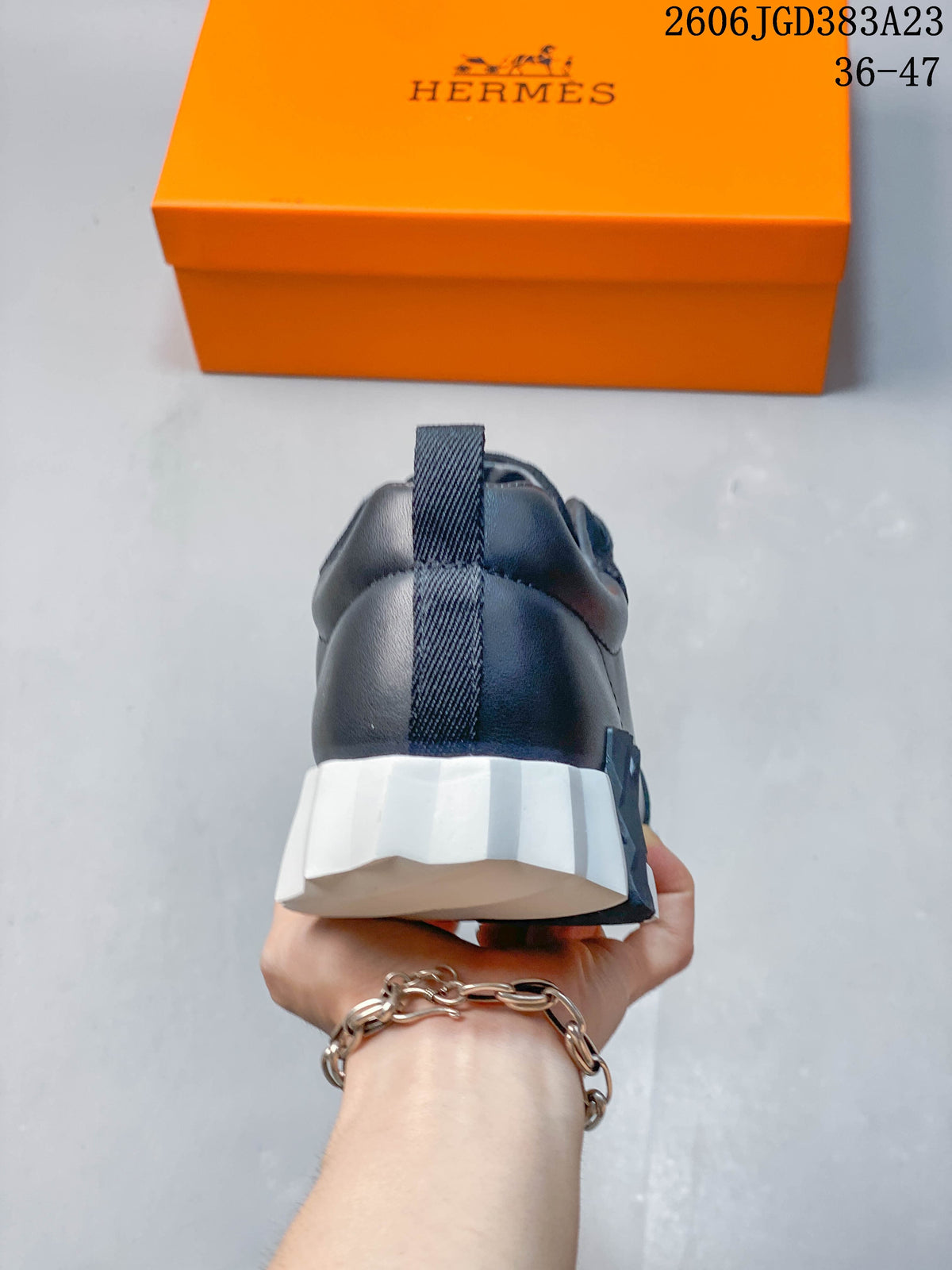 Hermès Low-Top Sneakers in Navy and White