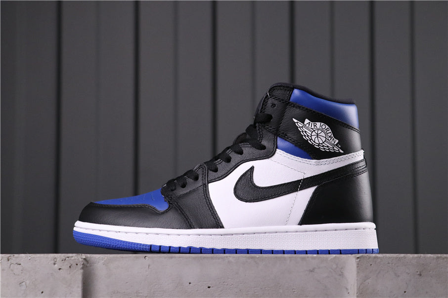 Side profile of a black, white and blue high-top sneaker showing the Jordan Wings logo.