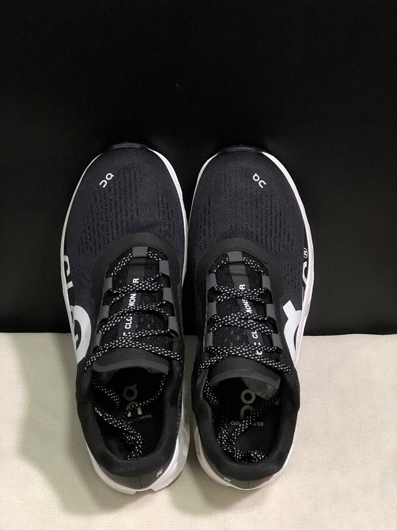 On Cloudmonster Black and White Running Sneakers