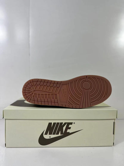 Underside view showing the gum-colored outsole and circular traction pattern.