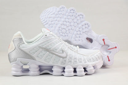 Nike Shox TL Sneakers in Black and Gold
