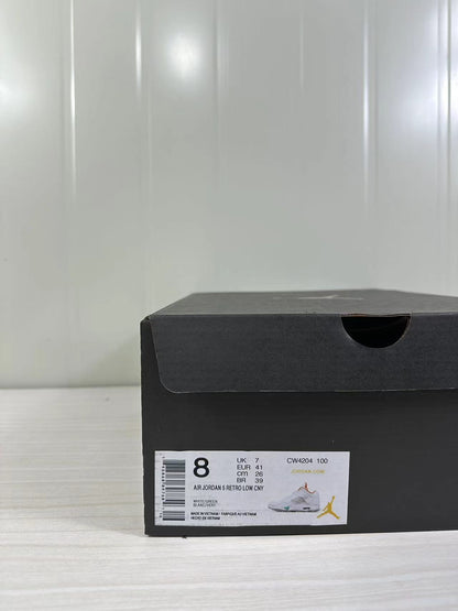 Black shoe box with a label showing Air Jordan 5 Retro Low, style code CW4204 100, EU 41, UK 7, CM 26, and BR 39.