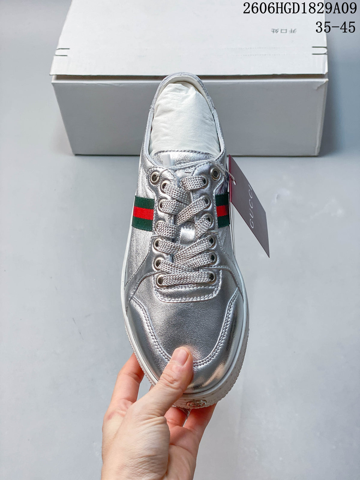 Gucci Silver Low-Top Sneakers with Green-Red Web Stripe