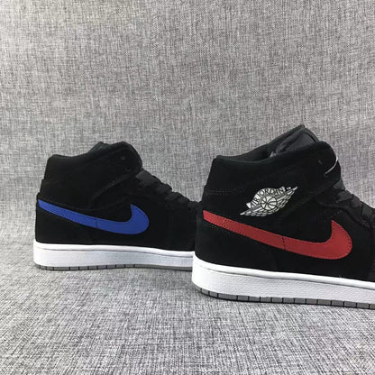 Three-quarter view of the pair with contrasting red and blue Swoosh details.