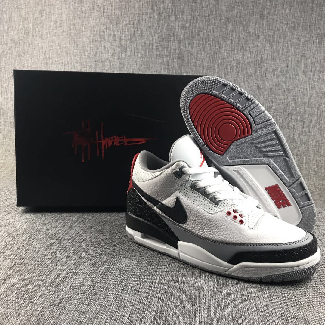 Air Jordan 3 sneaker pair displayed with one shoe resting on its outsole beside a black shoebox.