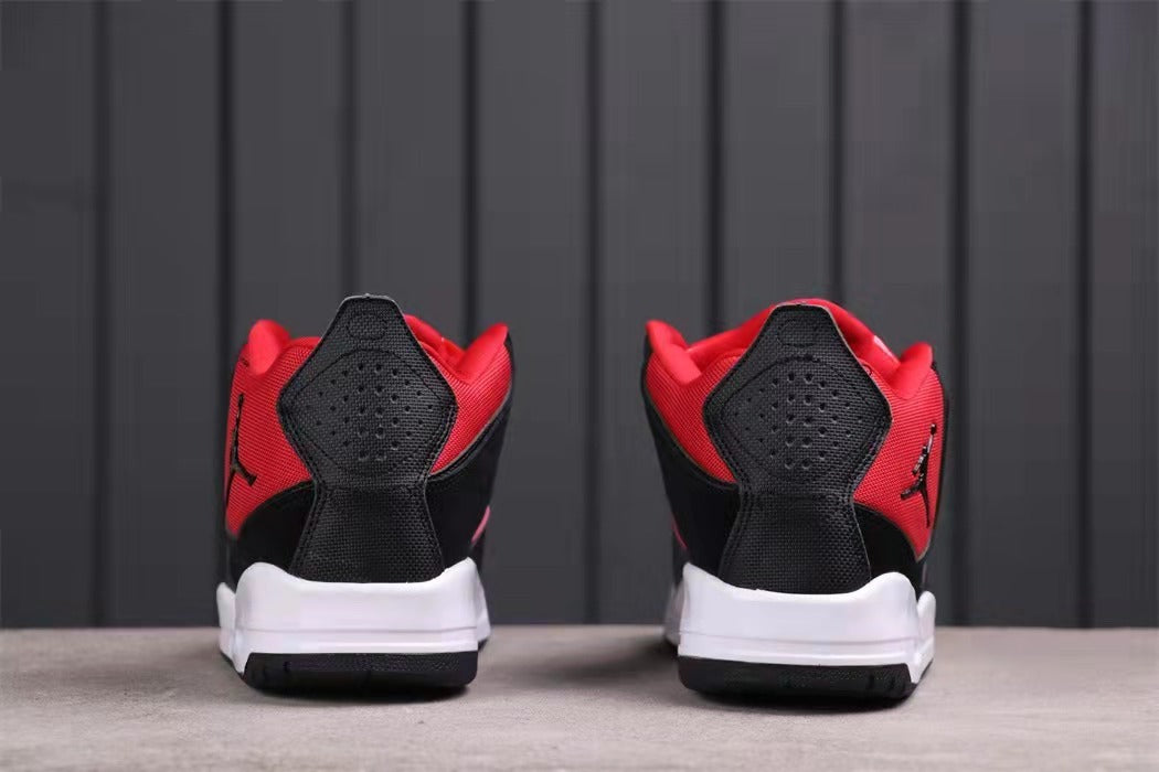 Rear view showing the red collars, black heel panels, and white midsoles.