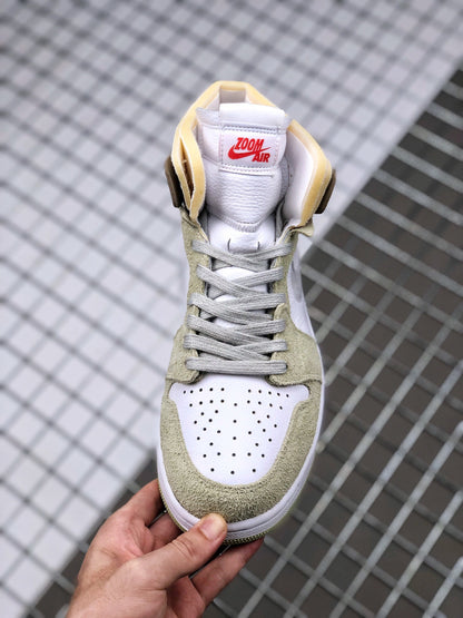 Top-down view of the sneaker showing the gray laces, olive green toe overlays, perforated white toe box, and Zoom Air tongue label.