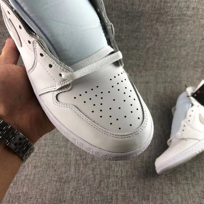 Close-up of the perforated white toe box and lace area.