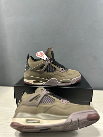 Angled product view showing the olive-brown upper, black mesh, mauve accents, and outsole pattern.