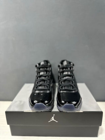Front view of the pair showing black laces, rounded toes, and translucent gray toe sections.