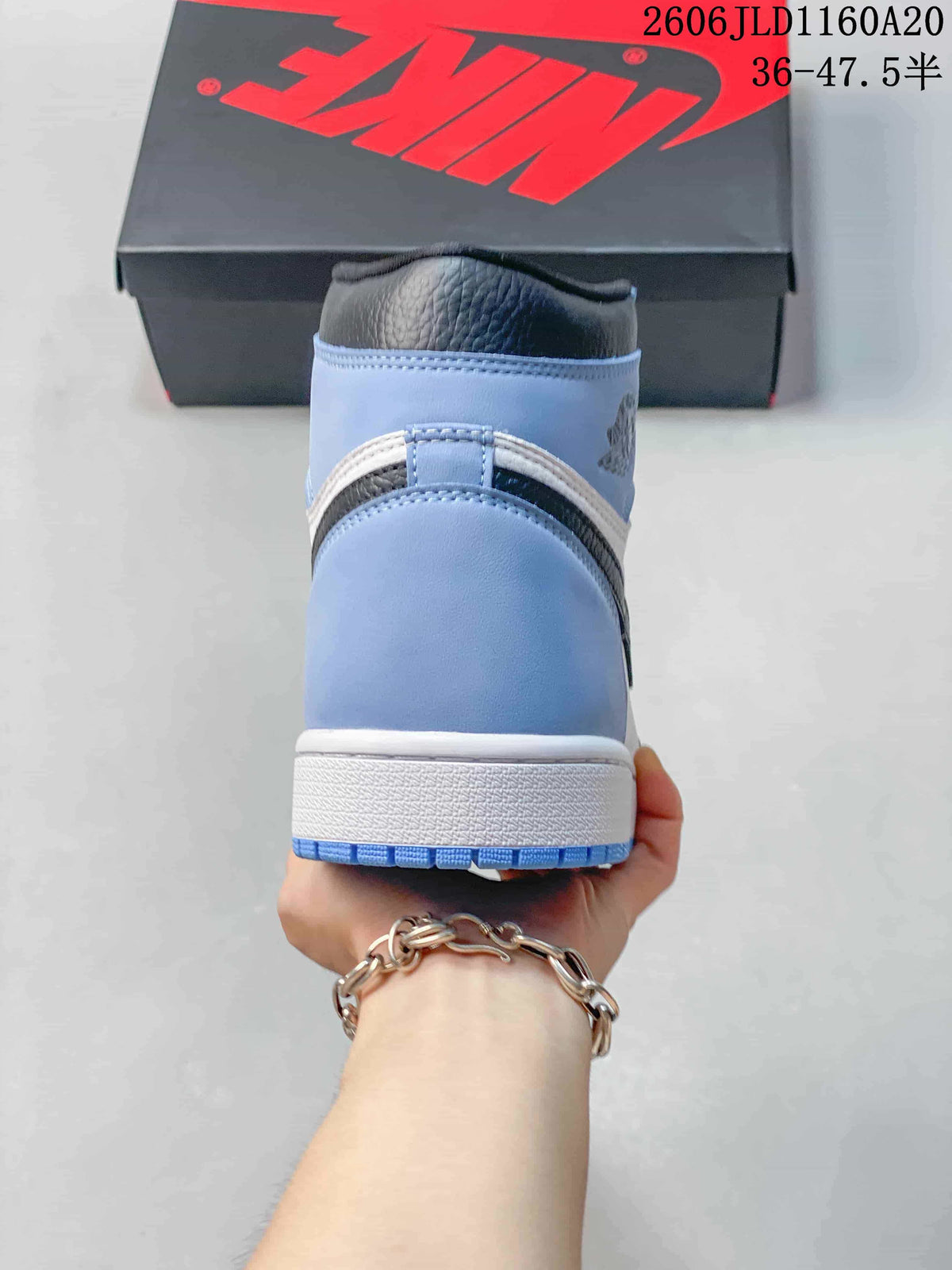 Jordan Air Jordan 1 High Sneakers in Blue and White