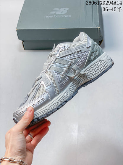 New Balance 1906 Sneakers in Silver Grey