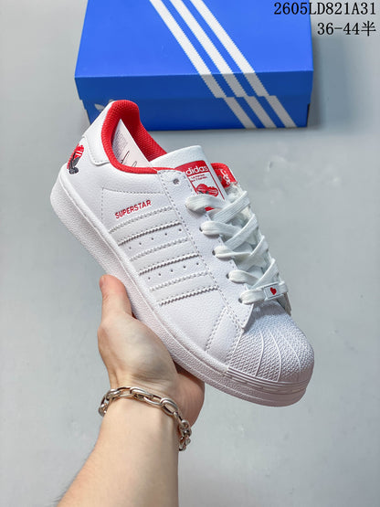 Adidas Superstar White Low-Top Sneakers with Red Accents