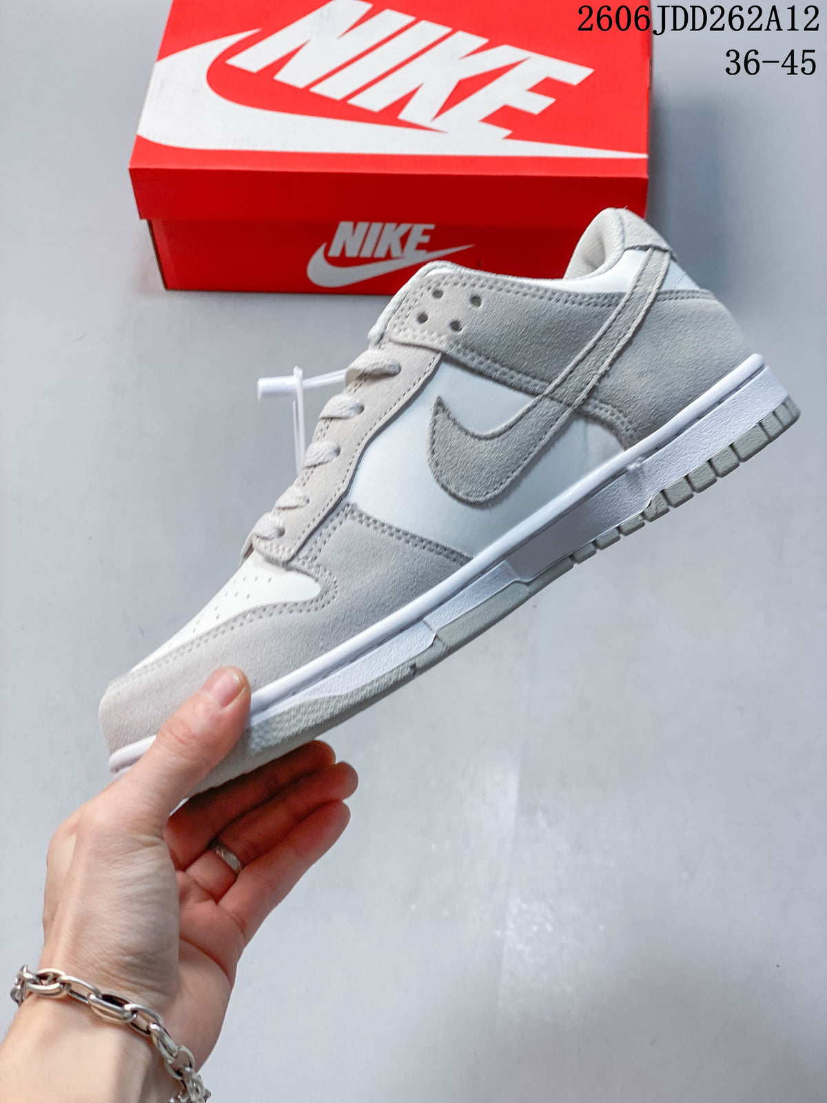 Nike Mini Swoosh Low-Top Sneakers in Sail and Grey