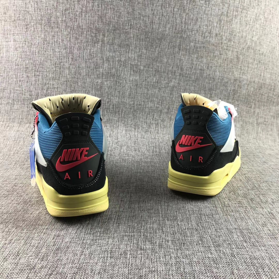 Rear view showing blue collars, black heel panels, red Nike branding, and yellow-toned heel sections.