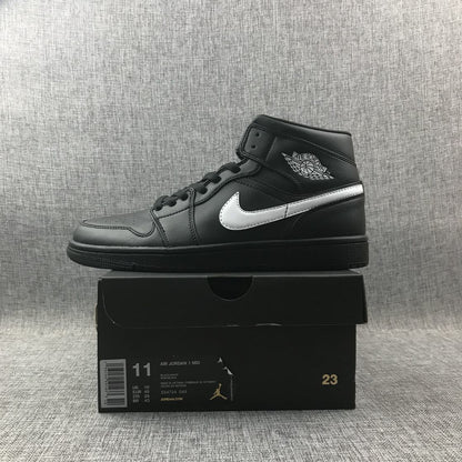 Side view of the sneaker above a box labeled Air Jordan 1 Mid; the box shows sample size EU 45, UK 10, CM 29 and US 11.