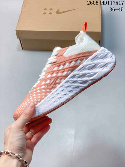 Nike Ava Rover Low-Top Sneakers in White and Coral