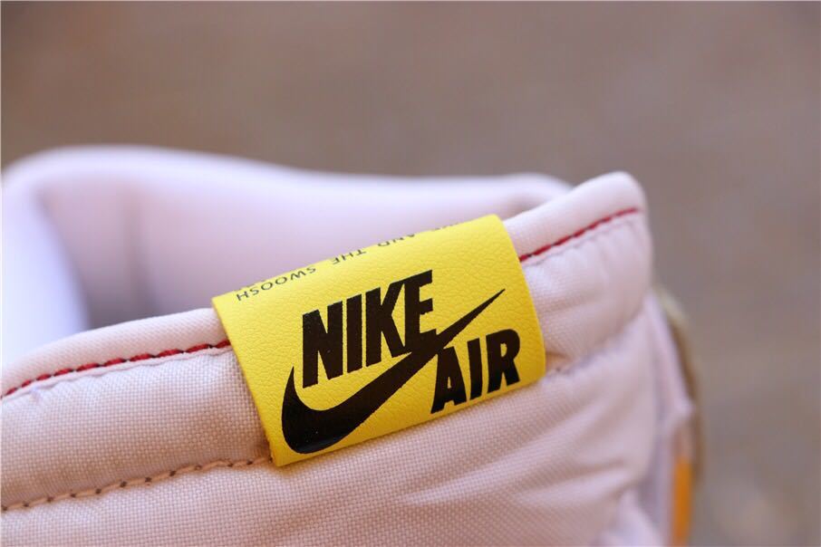Close-up of the yellow tongue label with Nike Air branding.