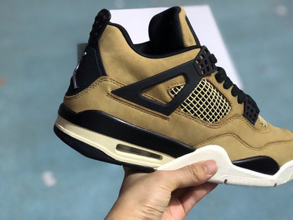 Close-up side view of the black support overlay, mesh panel, mushroom-toned upper, and heel window.