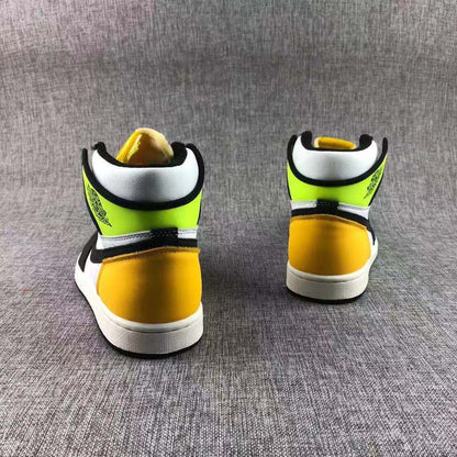 Rear pair view showing the yellow-gold heel sections and Volt collar panels.