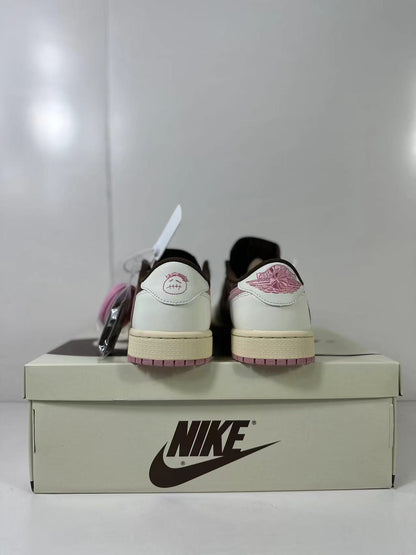 Rear view showing the heel details, cream midsole, and pink outsole.
