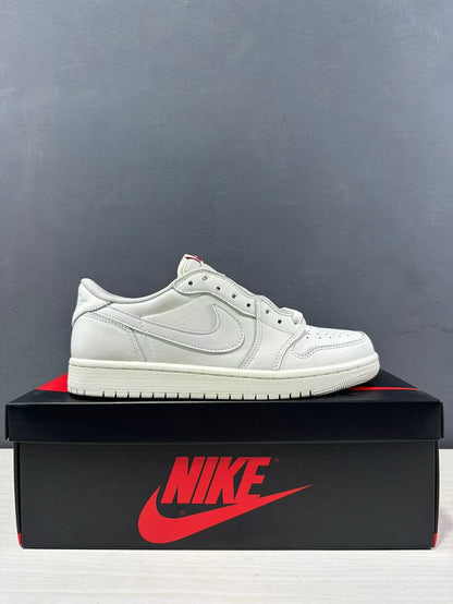 Side profile of a white low-top Jordan sneaker displayed on a branded shoe box.