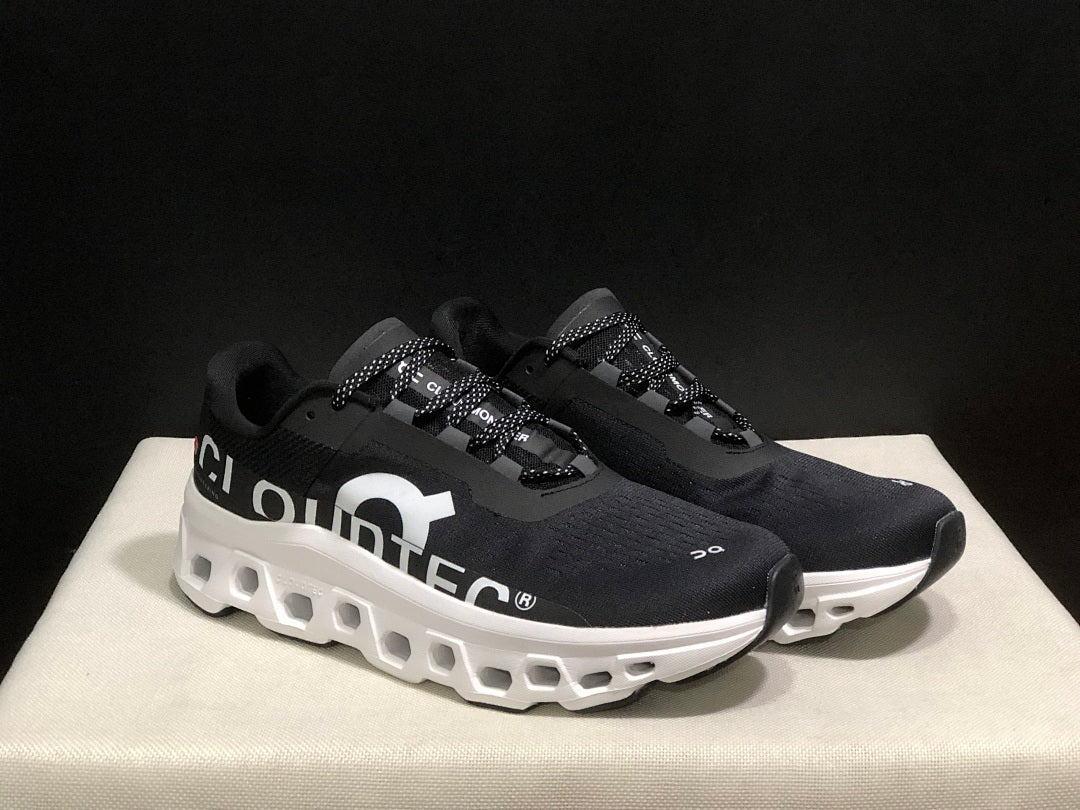 On Cloudmonster Black and White Running Sneakers