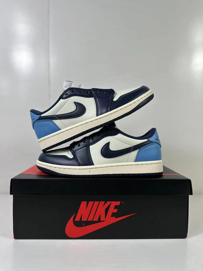 Two low-top sneakers displayed together on a Jordan shoebox, showing the side panels and rubber outsoles.
