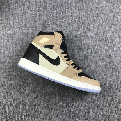 Side view of a beige, cream, and black Jordan high-top sneaker on gray fabric.