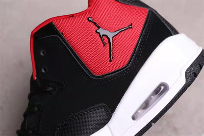 Close-up of the black and red upper, Jordan tongue logo, and white midsole window.