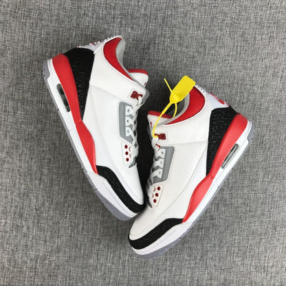 Top-down view of the pair showing the contrasting white, red, black, and gray color blocking.