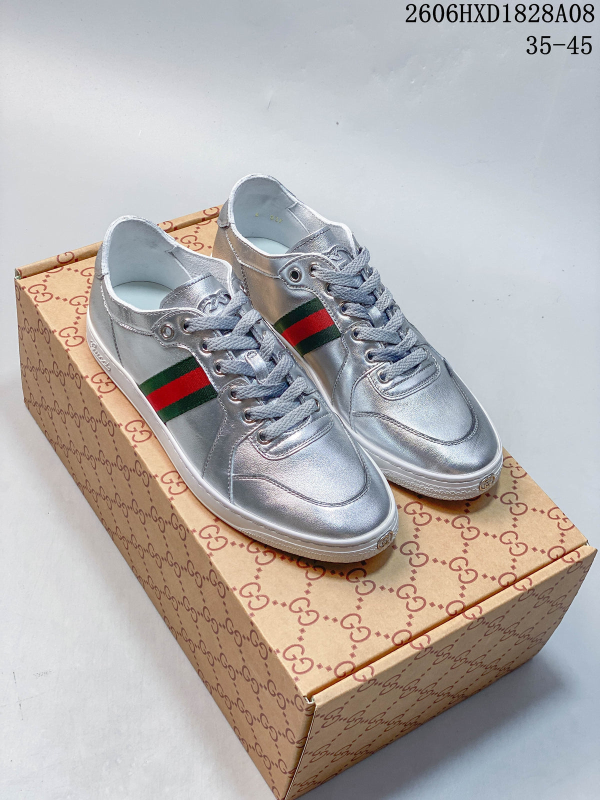 Gucci Silver Low-Top Sneakers with Green-Red Web Stripe