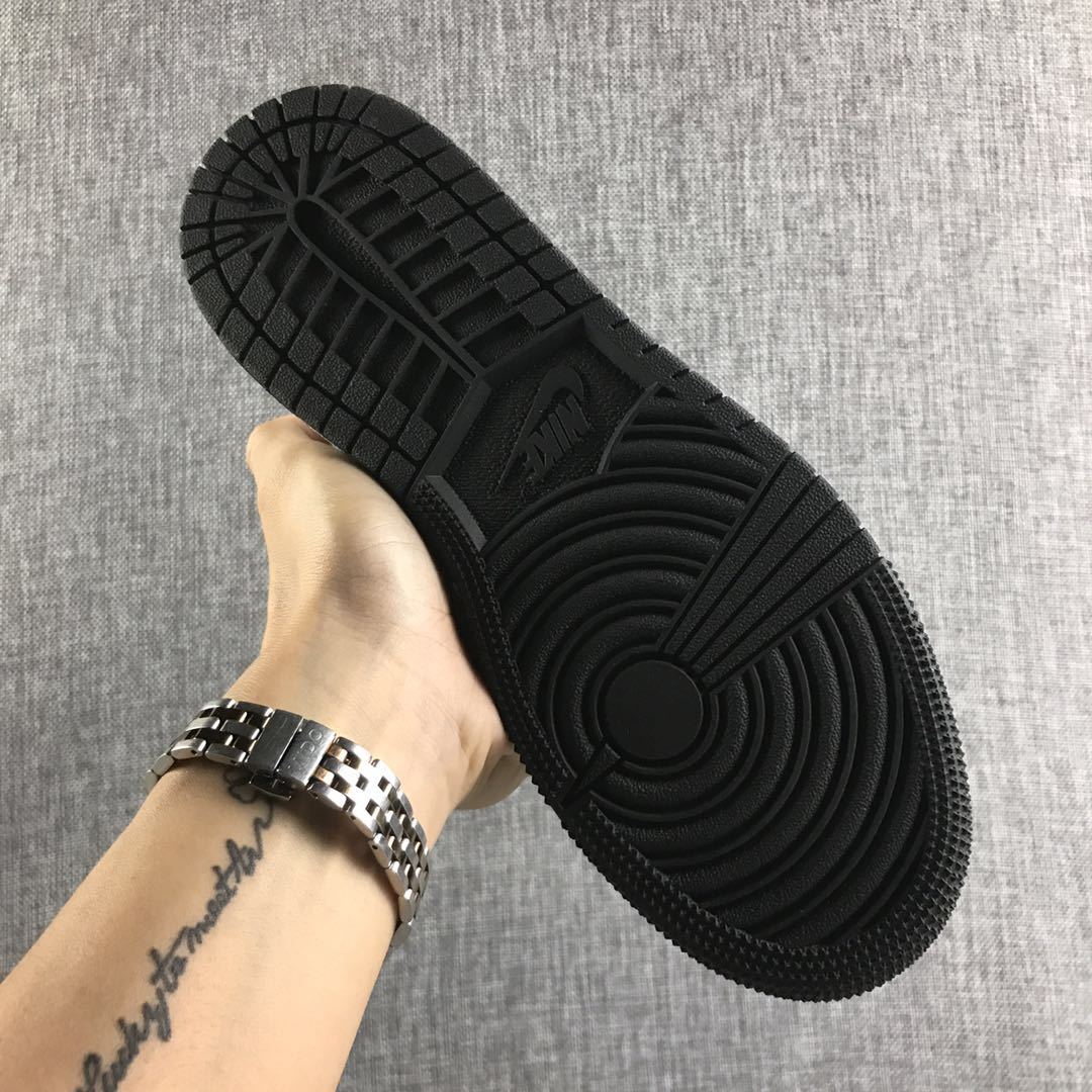 Underside view showing the black rubber outsole tread pattern.