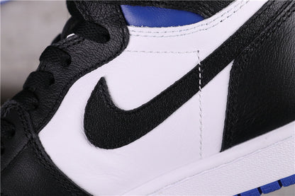 Close-up of a black Swoosh on a white side panel.