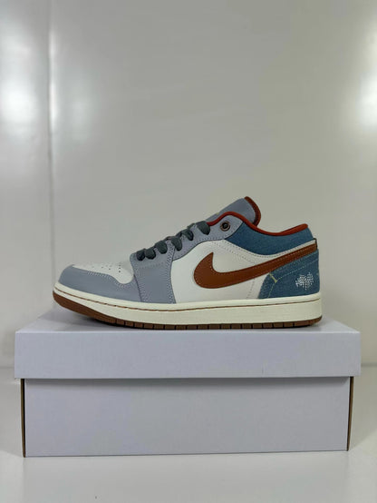 Side view of a blue, gray, off-white, and brown Air Jordan 1 Low sneaker