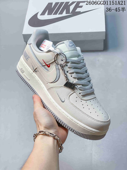 Nike Air Force 1 Low Sneakers in Cream and Ice Blue