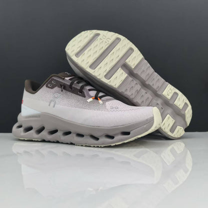 On Cloudmonster Running Shoes in Light Gray and Taupe