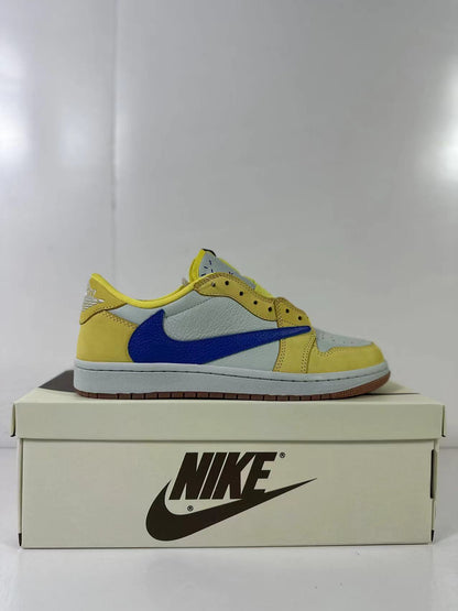 Side profile of a single yellow, light blue and blue low-top sneaker.
