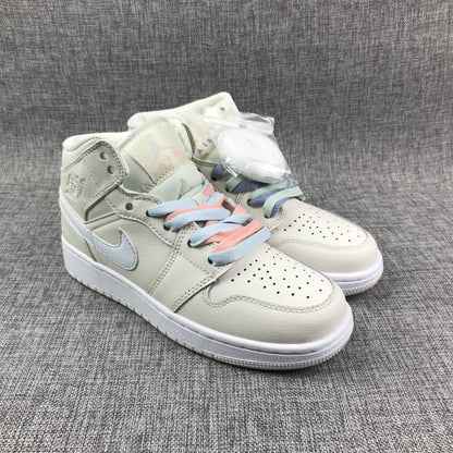 Pair of off-white high-top sneakers shown from a front three-quarter angle with pastel laces and perforated toe boxes.