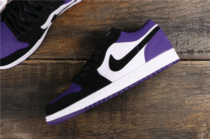 Side view showing the black Swoosh, white side panel, purple heel, and white midsole.