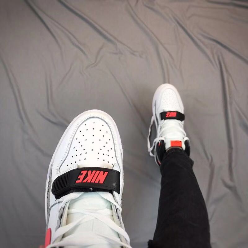 Top view showing the perforated white toe box, white laces, and black forefoot strap.