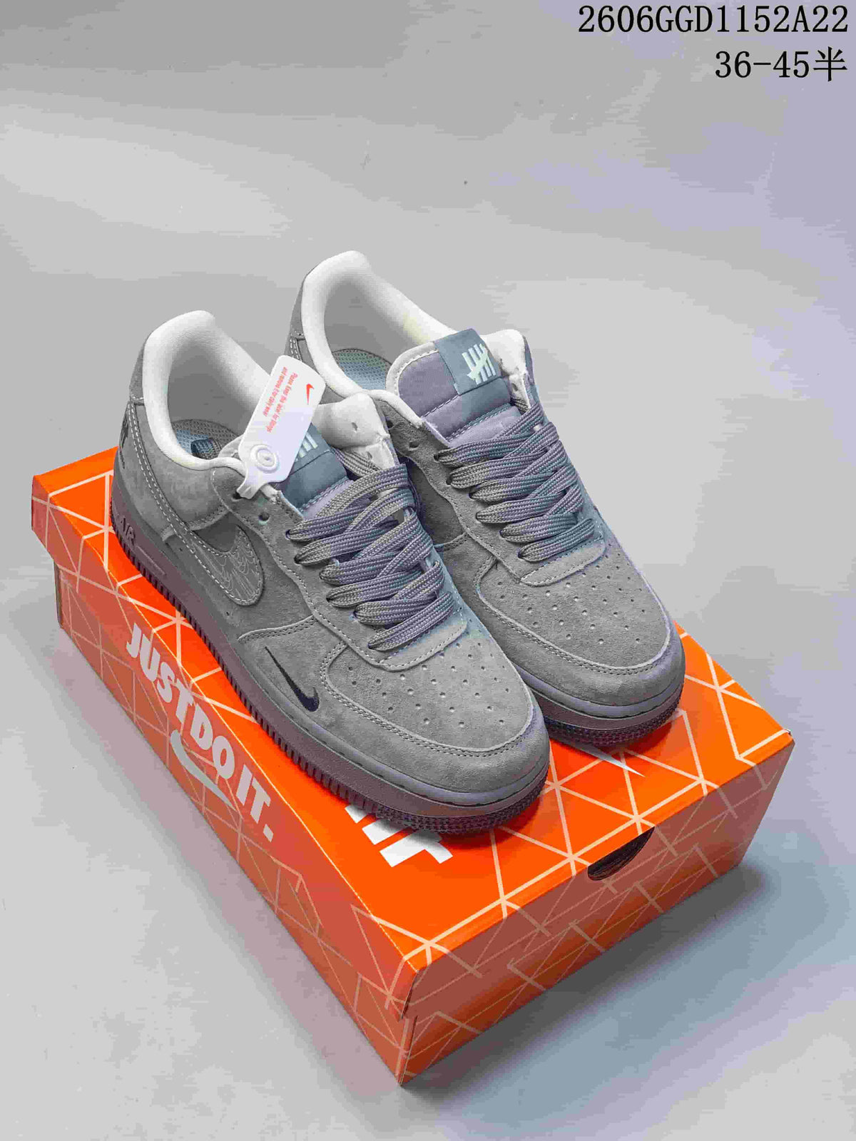 Nike Air Force 1 Low Grey Patterned Swoosh Sneakers