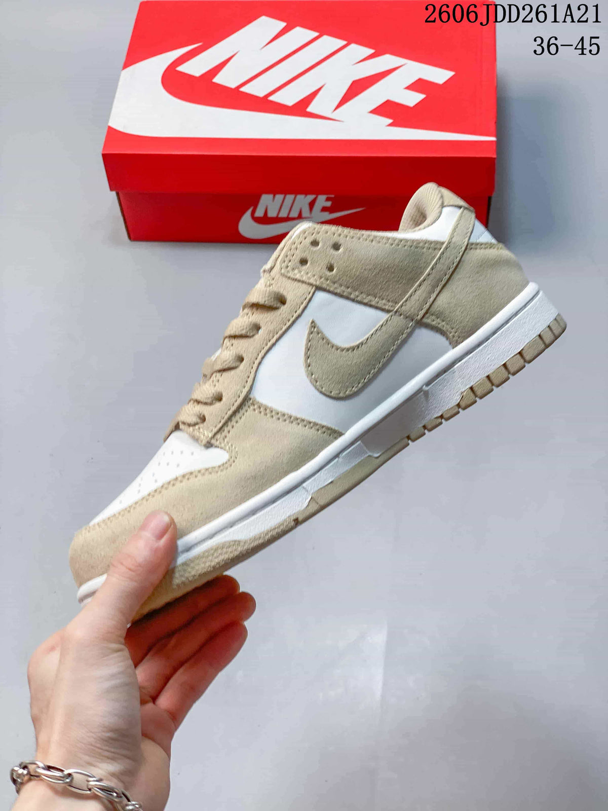 Nike Dunk Low Sneakers in White and Beige