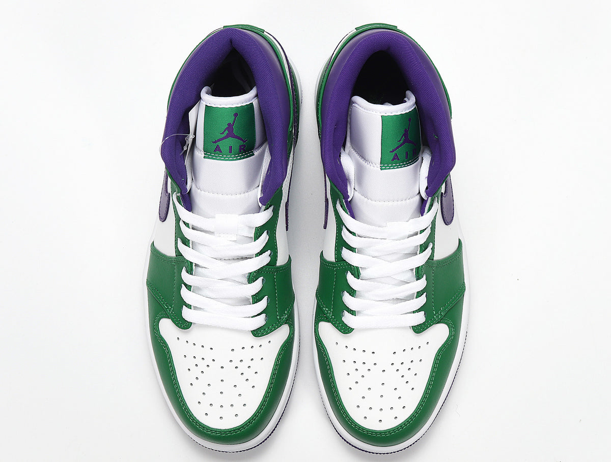 Top view of a pair of green, white and purple high-top sneakers with white laces.