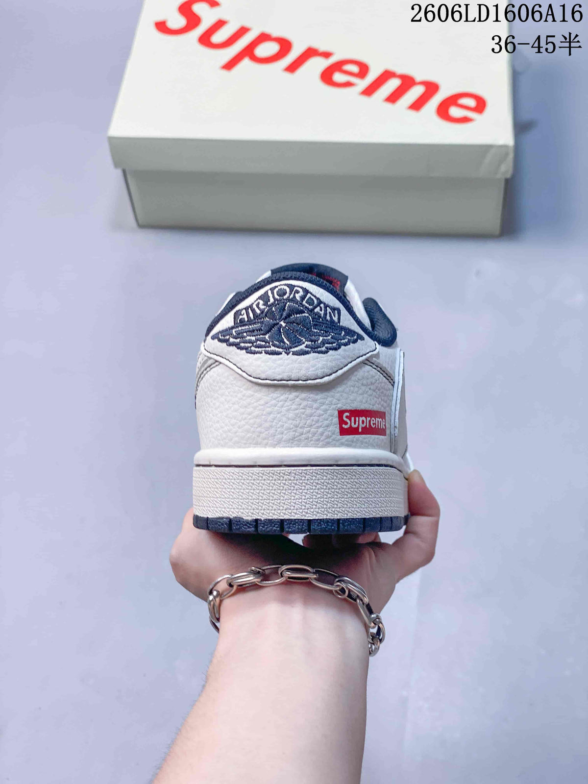 Jordan 1 Low Sneakers in White and Navy