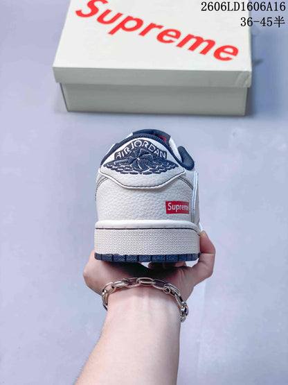 Jordan 1 Low Sneakers in White and Navy