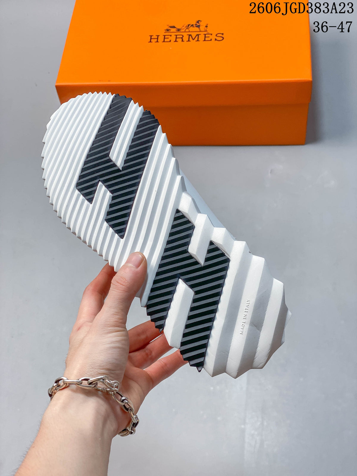 Hermès Low-Top Sneakers in White and Black