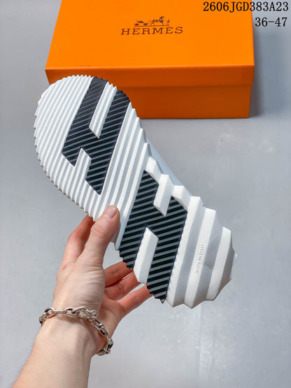 Hermès Low-Top Sneakers in White and Black