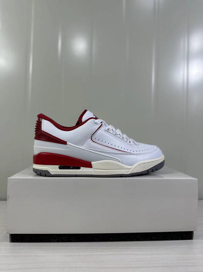 Clean side profile of the white and red low-top sneaker on a display box.